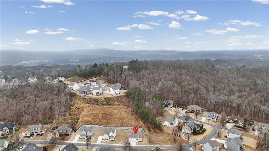 33 Brookside Way Cartersville, GA 30121 - Photo 44 of 54 a view of a terrace with a table and chairs