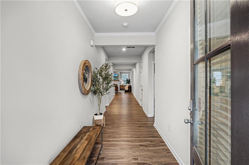 33 Brookside Way Cartersville, GA 30121 - Photo 6 of 54 a view of a hallway with wooden floor and staircase