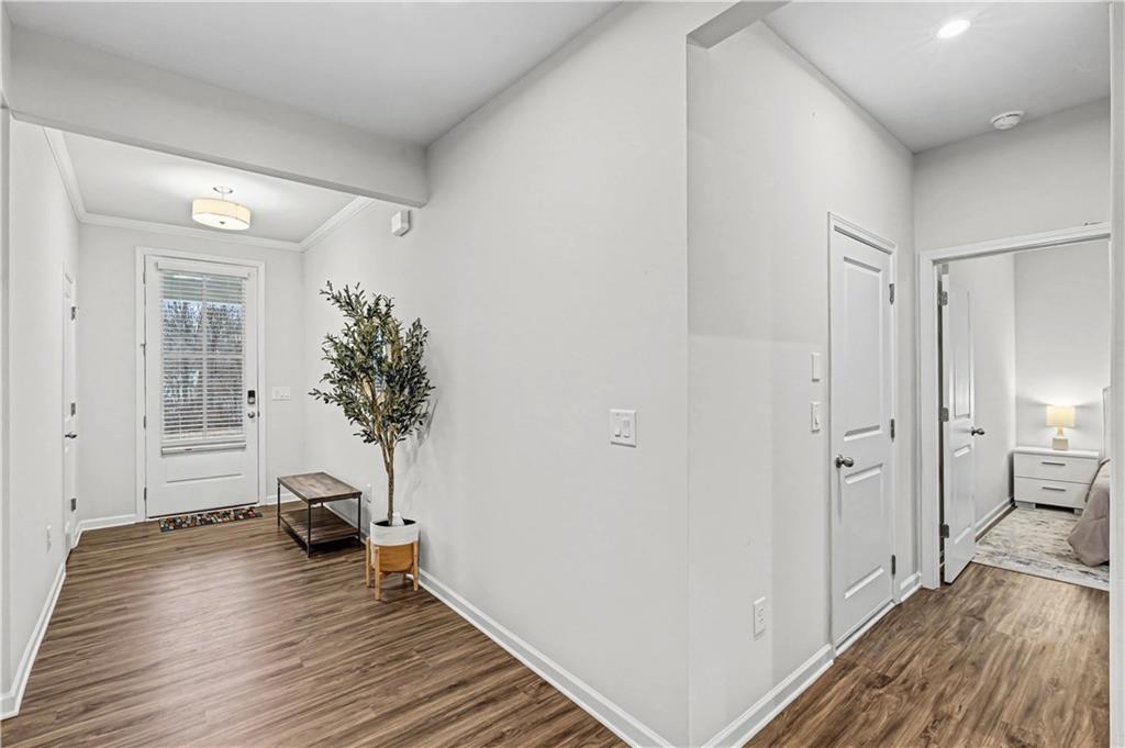 33 Brookside Way Cartersville, GA 30121 - Photo 7 of 54 a view of a livingroom with wooden floor and a bathroom