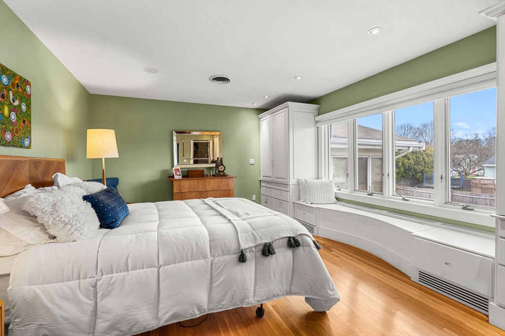 58 Leicester Road Marblehead, MA 01945 - Photo 28 of 42 a bedroom with a large bed and a large window