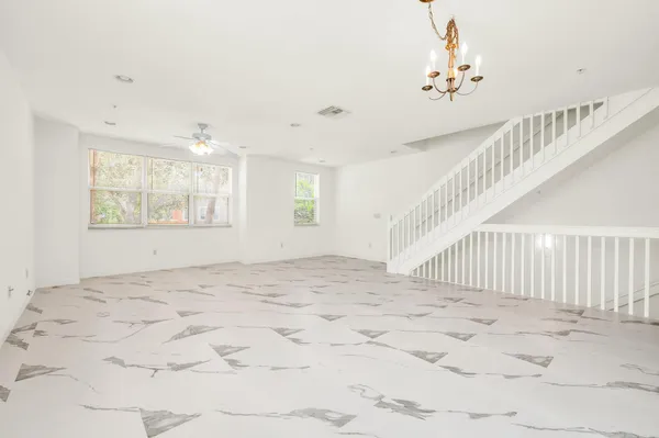 a view of an empty room and window