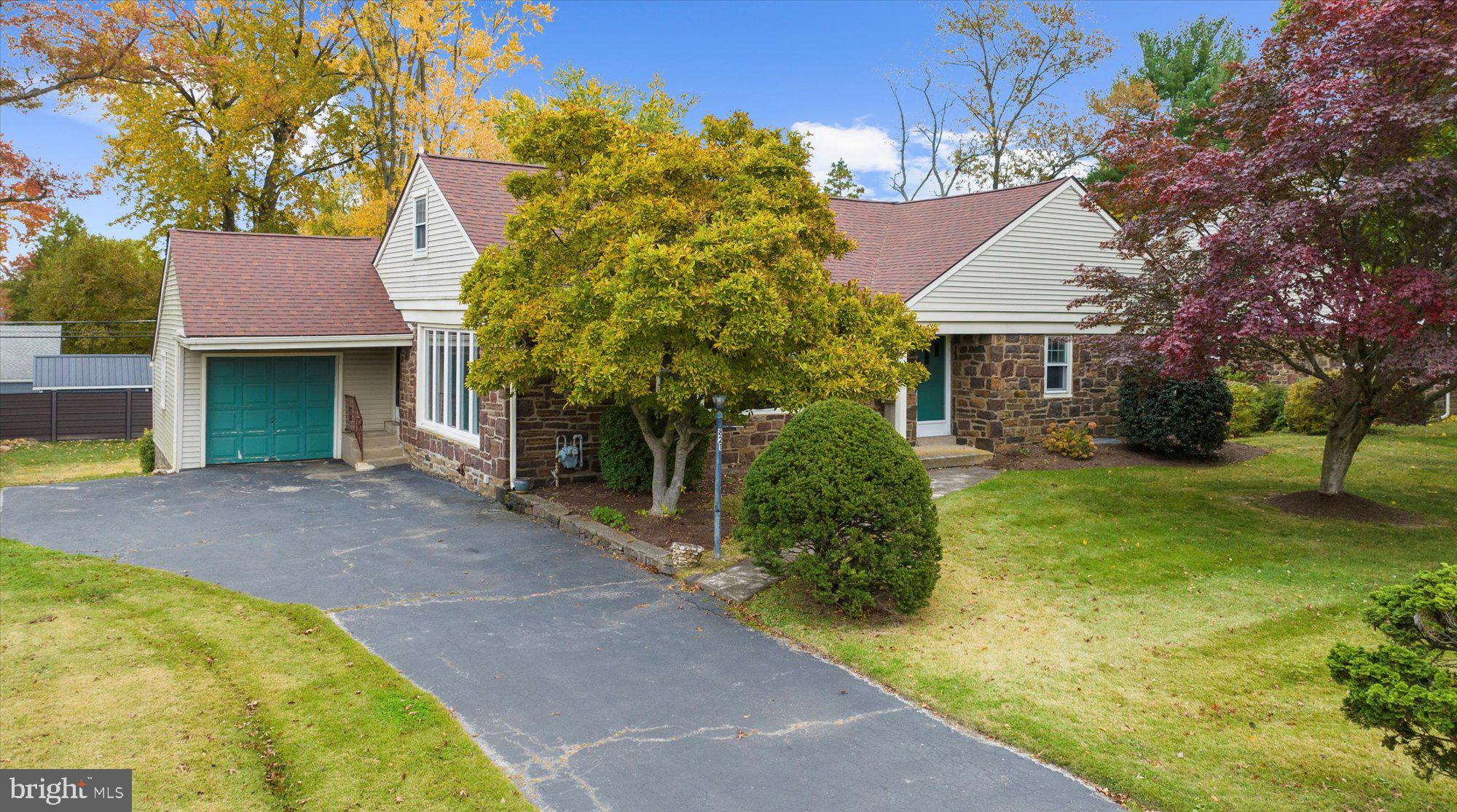 821 Coopertown Road Bryn Mawr, PA 19010 - Photo 1 of 44 a view of a house with a backyard