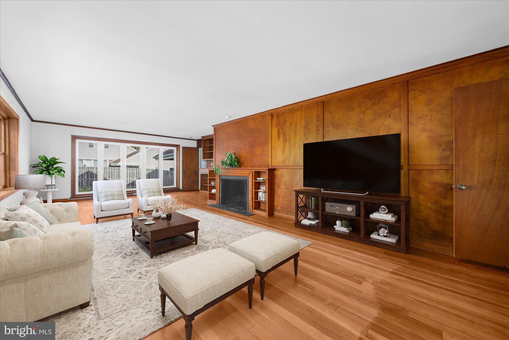 821 Coopertown Road Bryn Mawr, PA 19010 - Photo 2 of 44 a living room with furniture and a flat screen tv