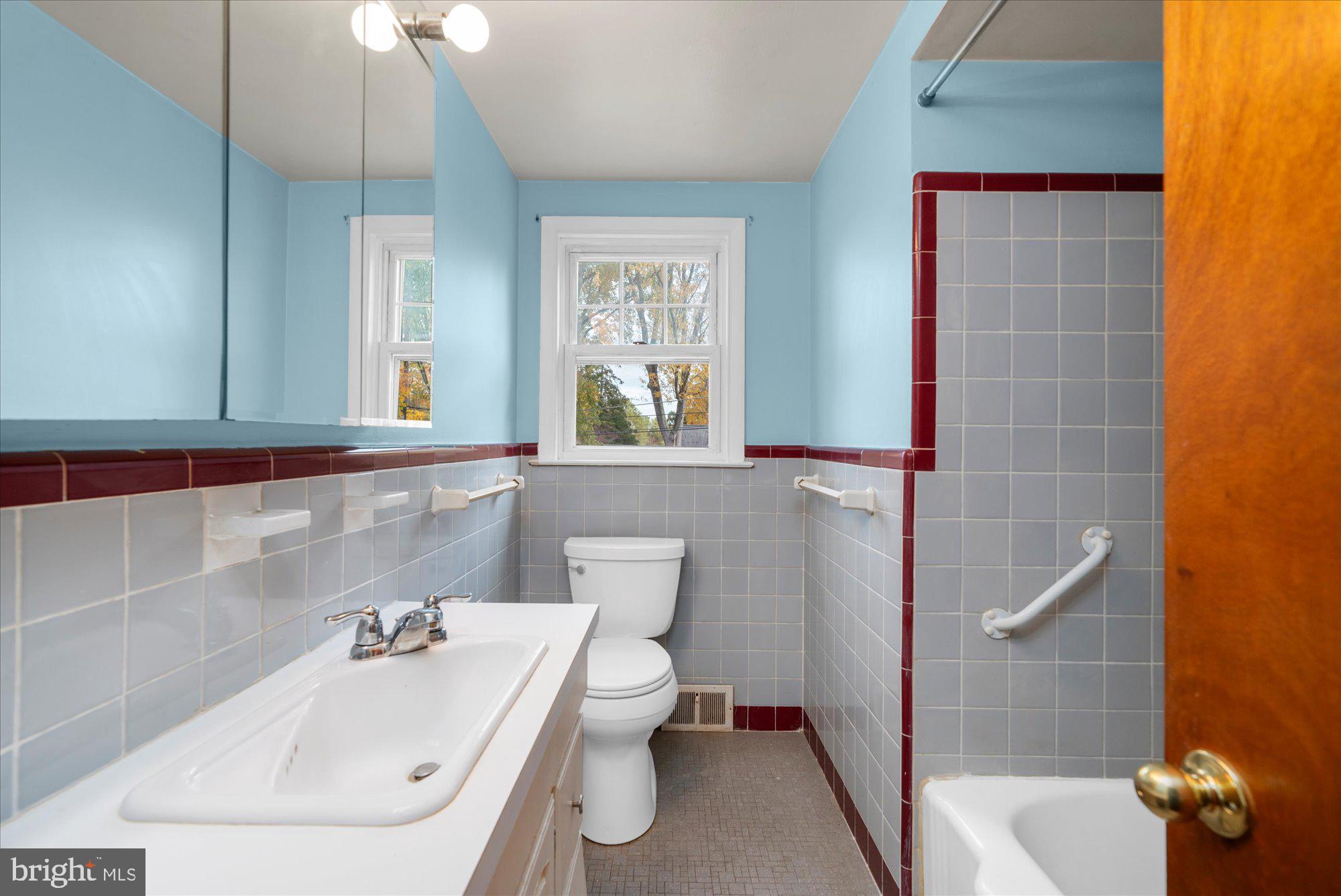 821 Coopertown Road Bryn Mawr, PA 19010 - Photo 21 of 44 a bathroom with a sink a toilet and shower