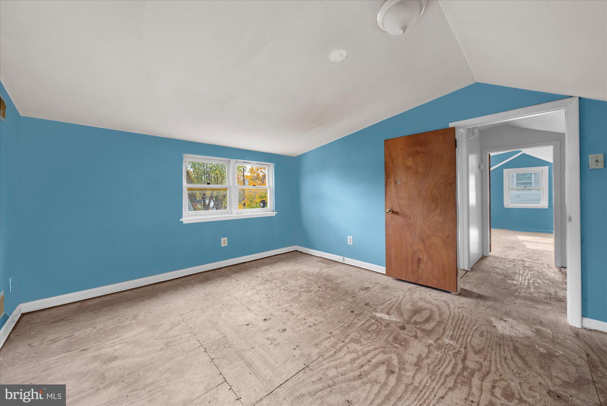 821 Coopertown Road Bryn Mawr, PA 19010 - Photo 23 of 44 an empty room with a empty space and windows