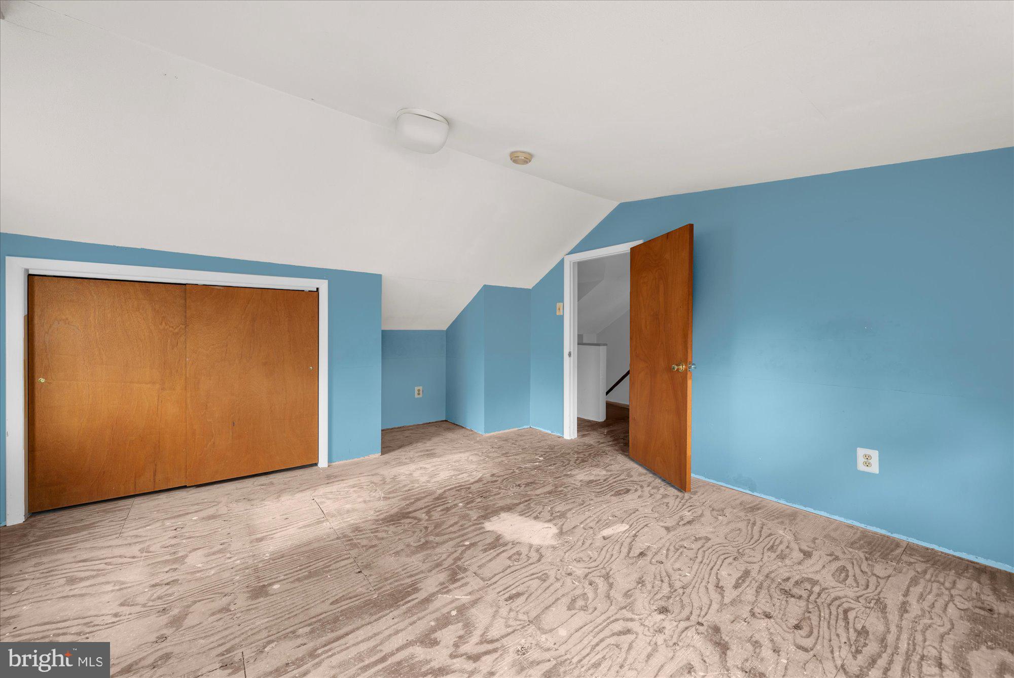 821 Coopertown Road Bryn Mawr, PA 19010 - Photo 26 of 44 a view of a room with a wooden floor and cabinets