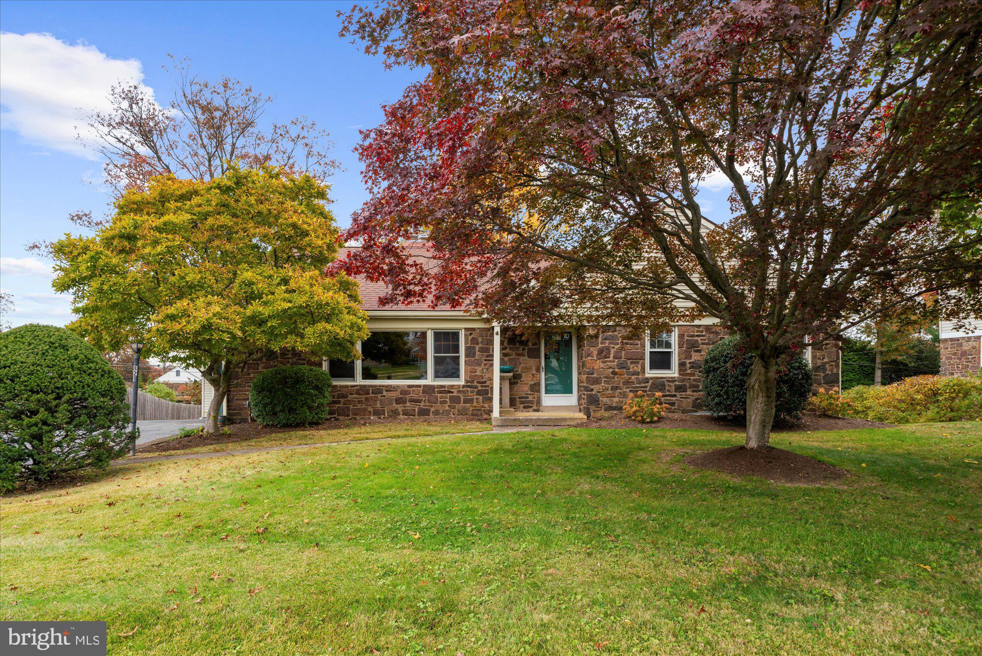 821 Coopertown Road Bryn Mawr, PA 19010 - Photo 42 of 44 a house view with a sitting space and garden