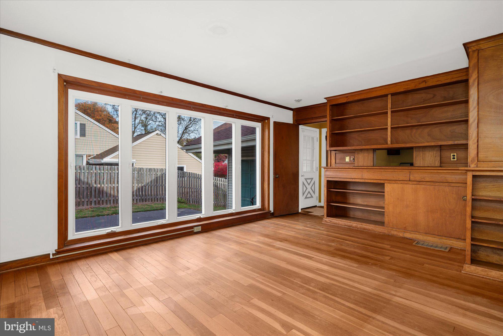 821 Coopertown Road Bryn Mawr, PA 19010 - Photo 10 of 44 a view of a big room with wooden floor and windows