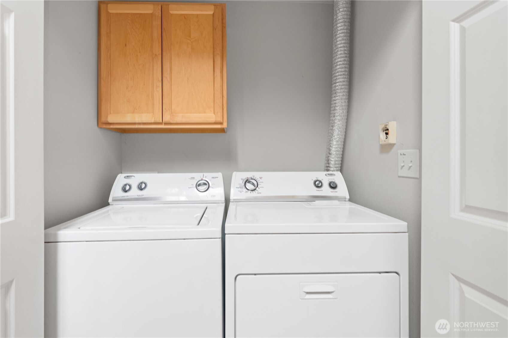 5062 23rd Avenue Southwest Seattle, WA 98106 - Photo 18 of 39 a utility room with dryer and washer