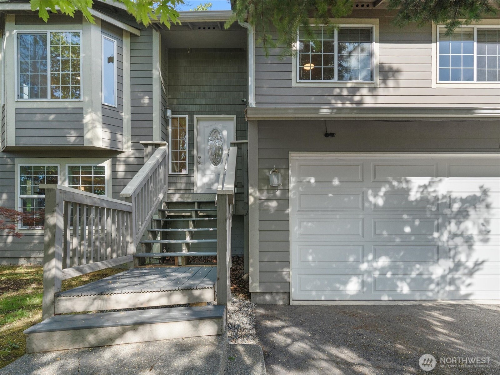 5062 23rd Avenue Southwest Seattle, WA 98106 - Photo 2 of 39 a view of a house with a window