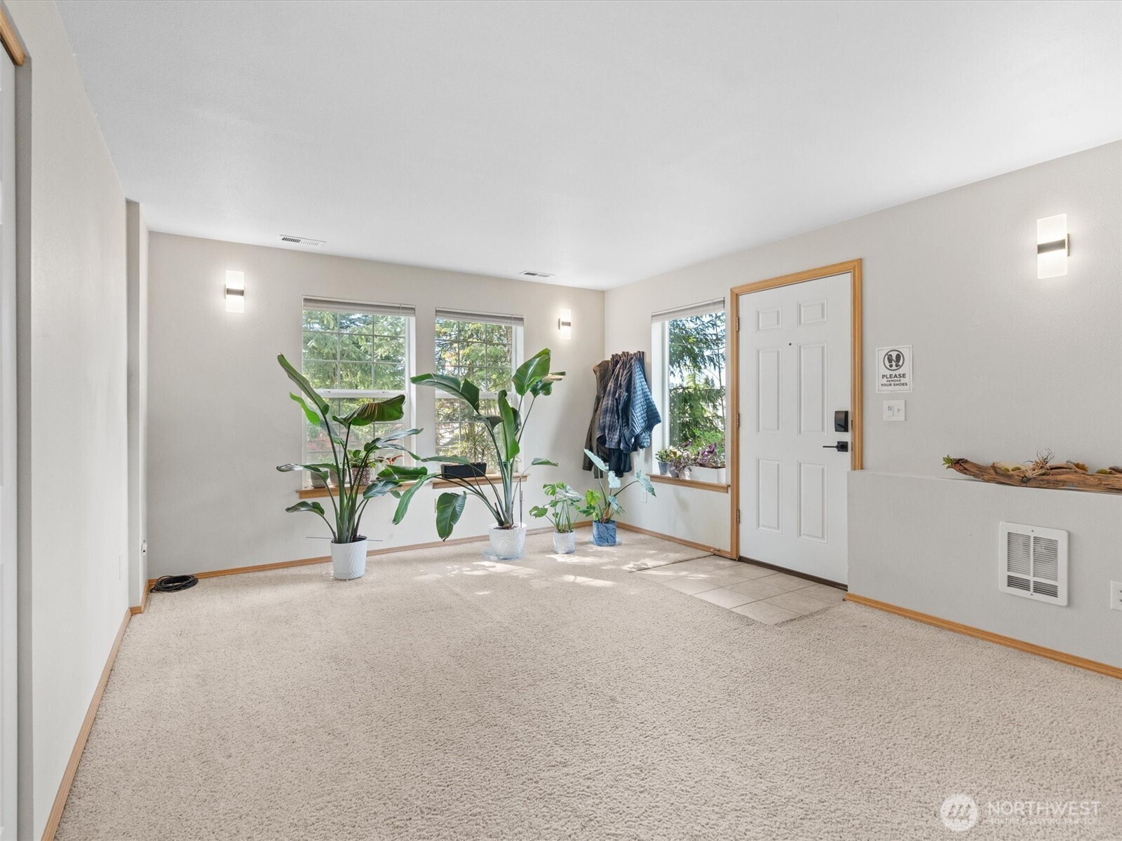 5062 23rd Avenue Southwest Seattle, WA 98106 - Photo 27 of 39 a view of livingroom with furniture and garden view