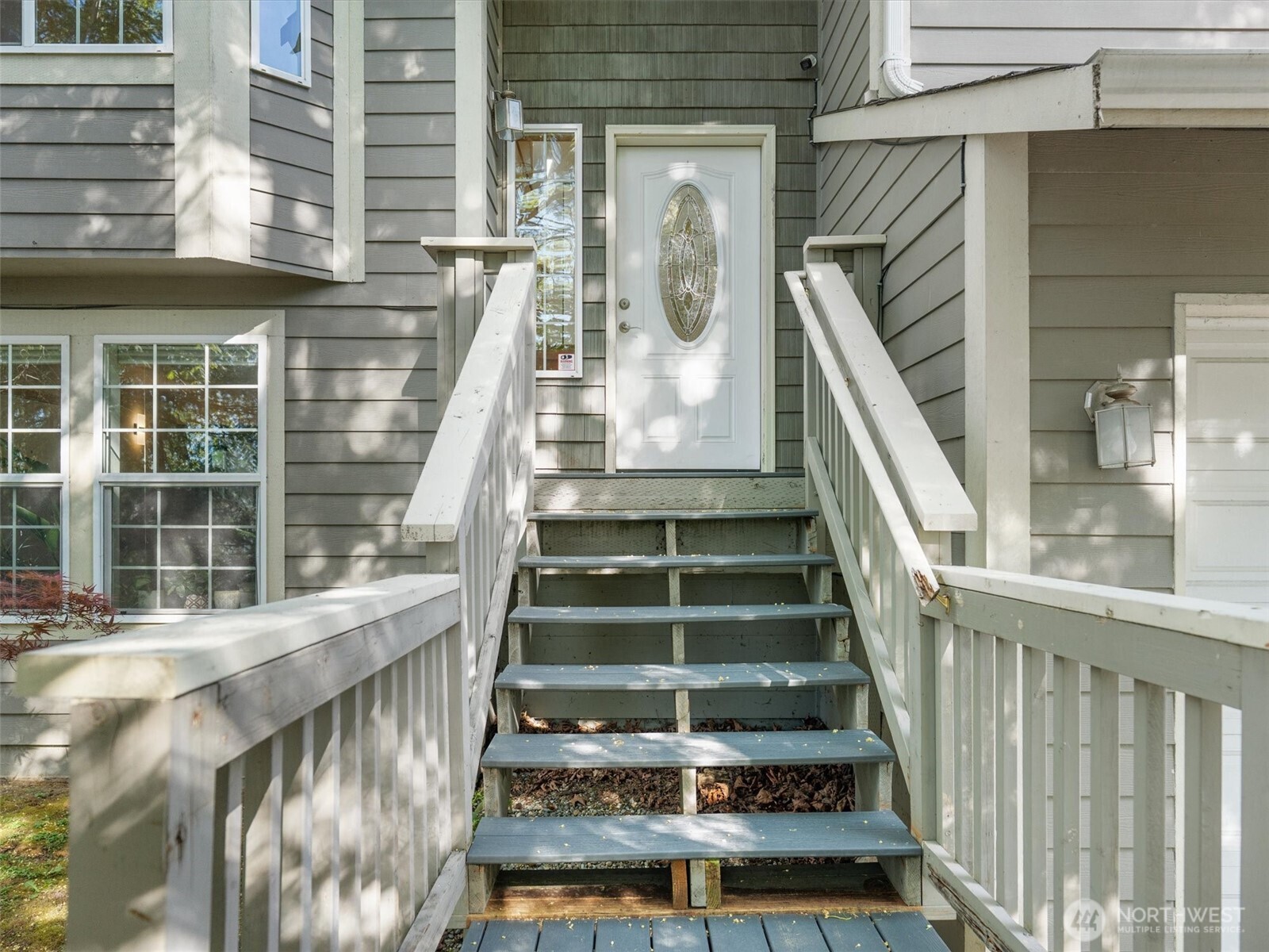 5062 23rd Avenue Southwest Seattle, WA 98106 - Photo 3 of 39 a view of entryway with wooden floor and a front door