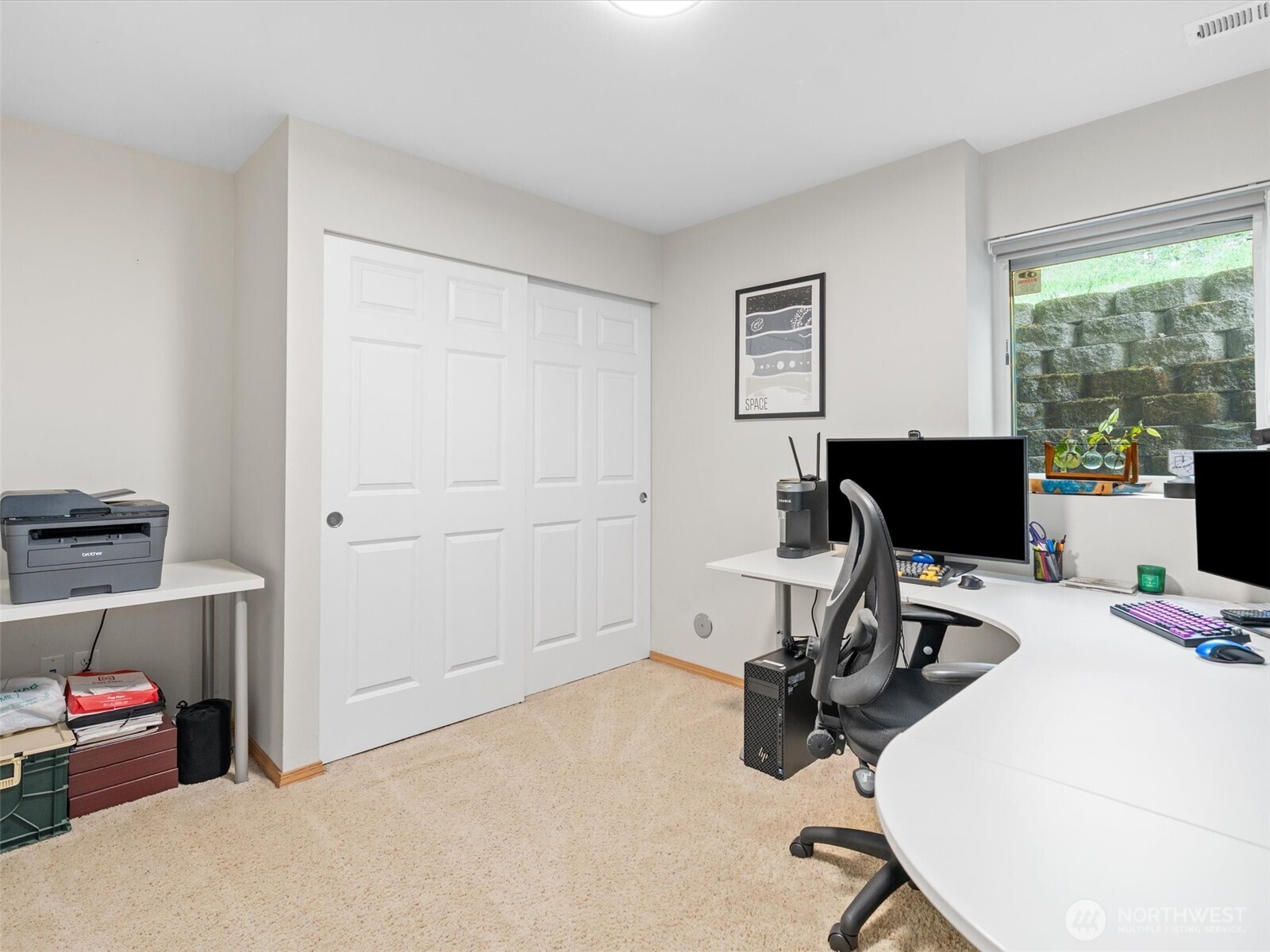 5062 23rd Avenue Southwest Seattle, WA 98106 - Photo 36 of 39 a work room with furniture and wooden floor
