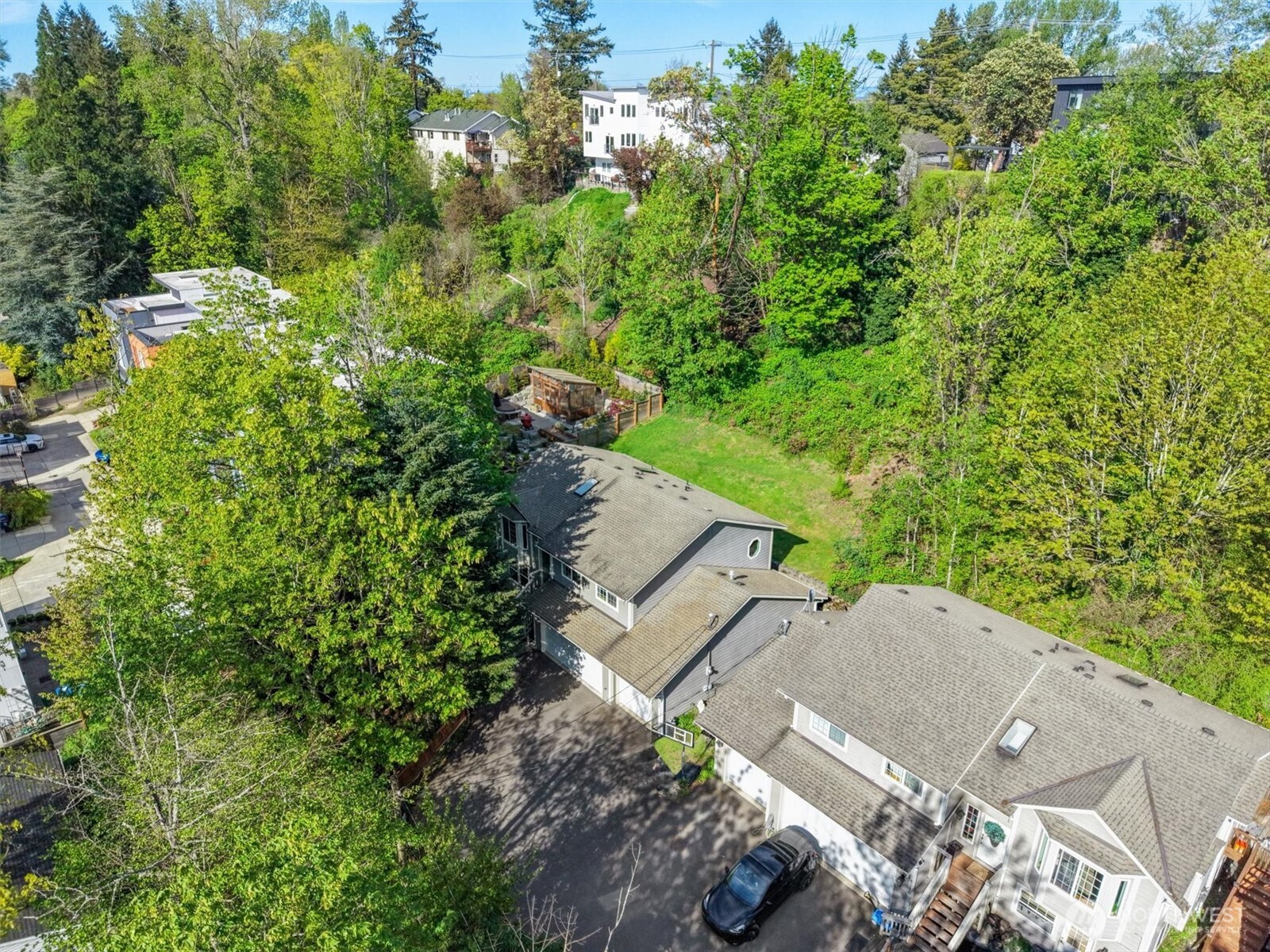 5062 23rd Avenue Southwest Seattle, WA 98106 - Photo 38 of 39 an aerial view of a house with a yard