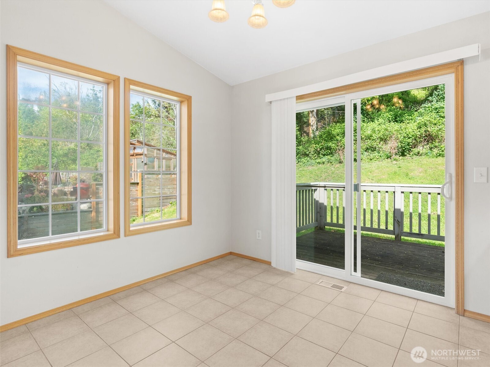 5062 23rd Avenue Southwest Seattle, WA 98106 - Photo 10 of 39 a view of an empty room and window