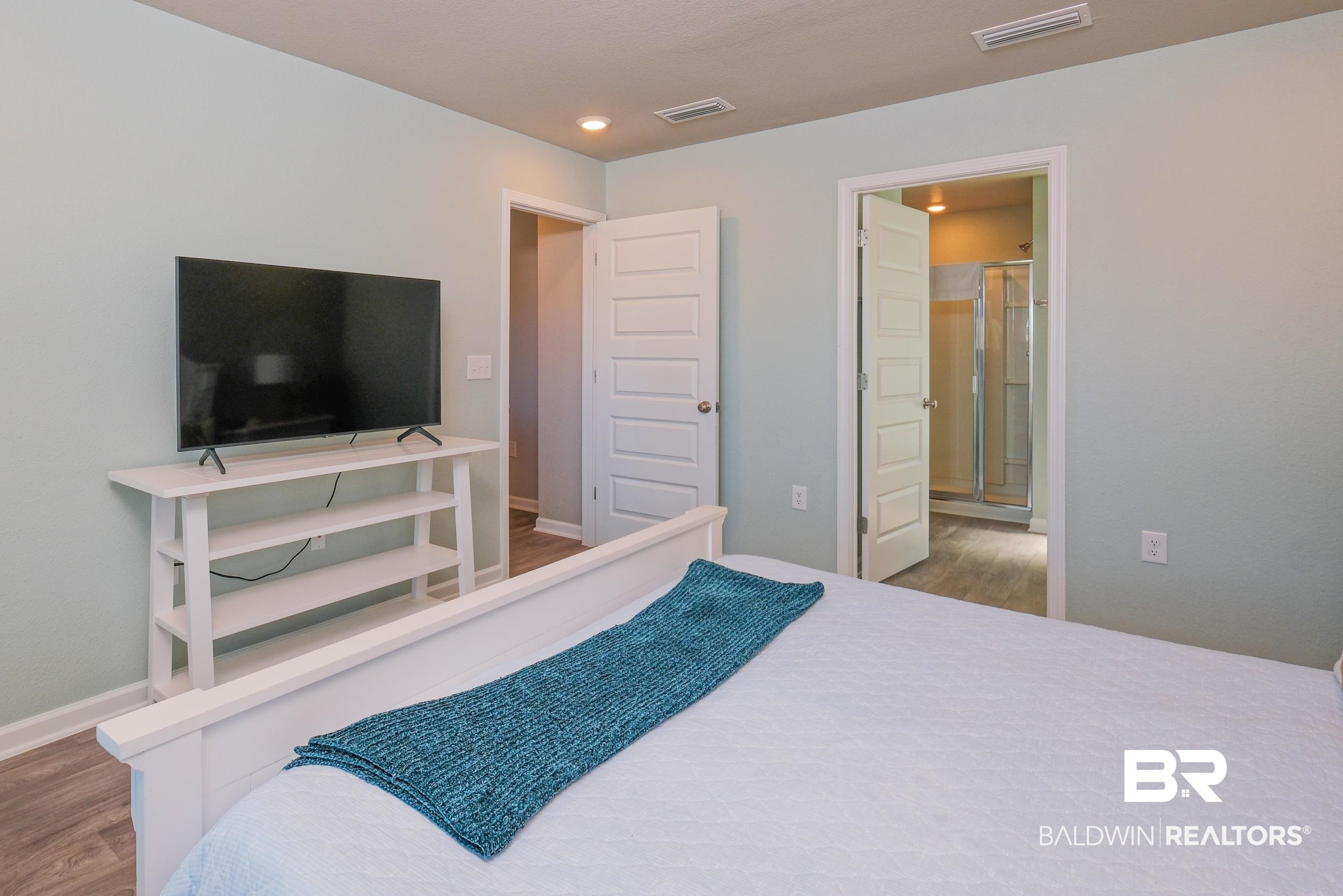 7425 Coppin Drive Foley, AL 36535 - Photo 18 of 41 Bedroom featuring hardwood / wood-style flooring