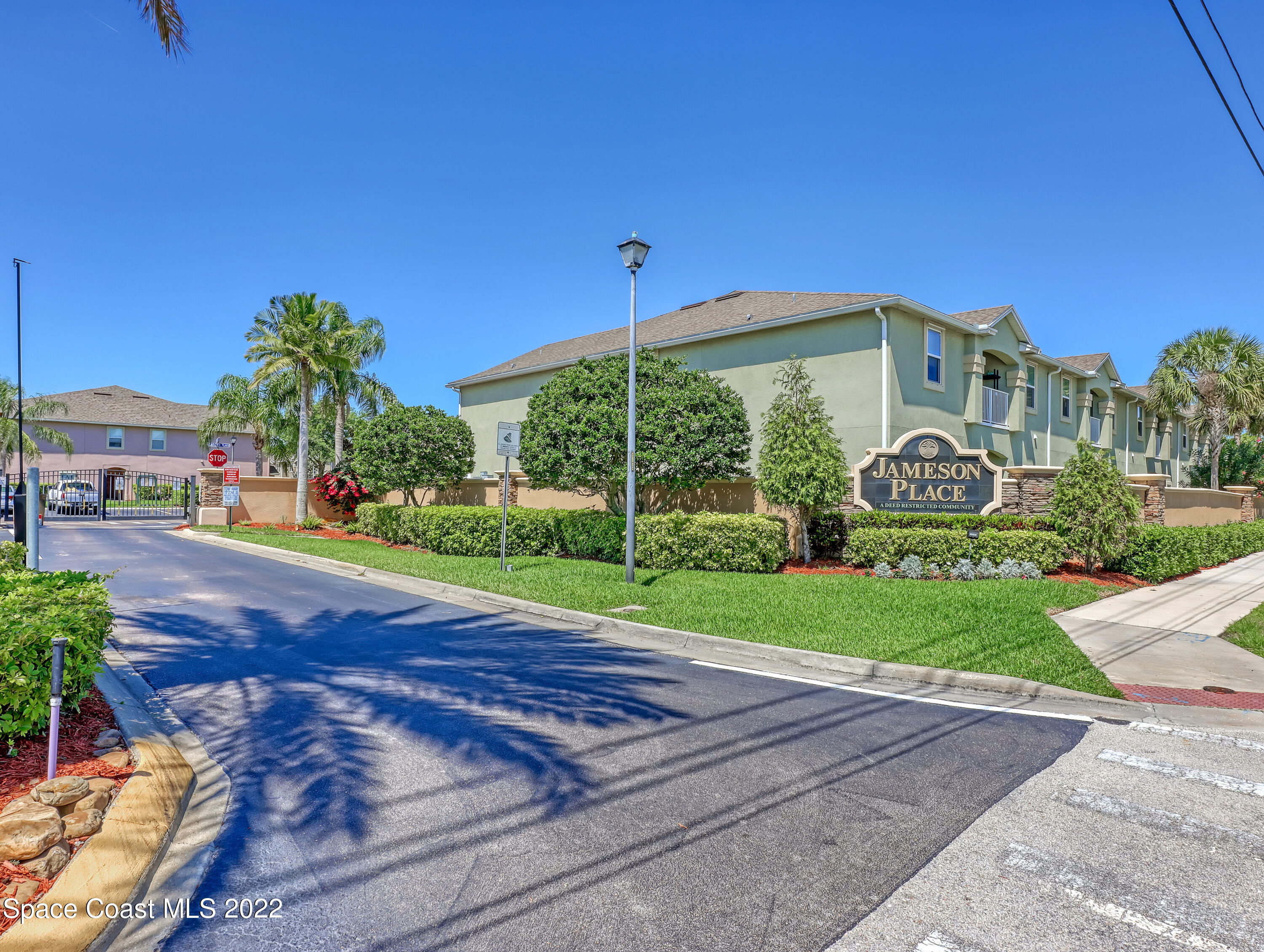 4077 Meander Place Rockledge, FL 32955 - Photo 20 of 24 a view of a house with a yard