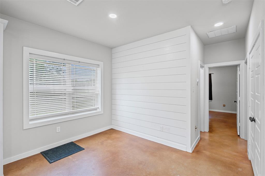 166 South Bronco Court Springtown, TX 76082 - Photo 13 of 40 an empty room with a window