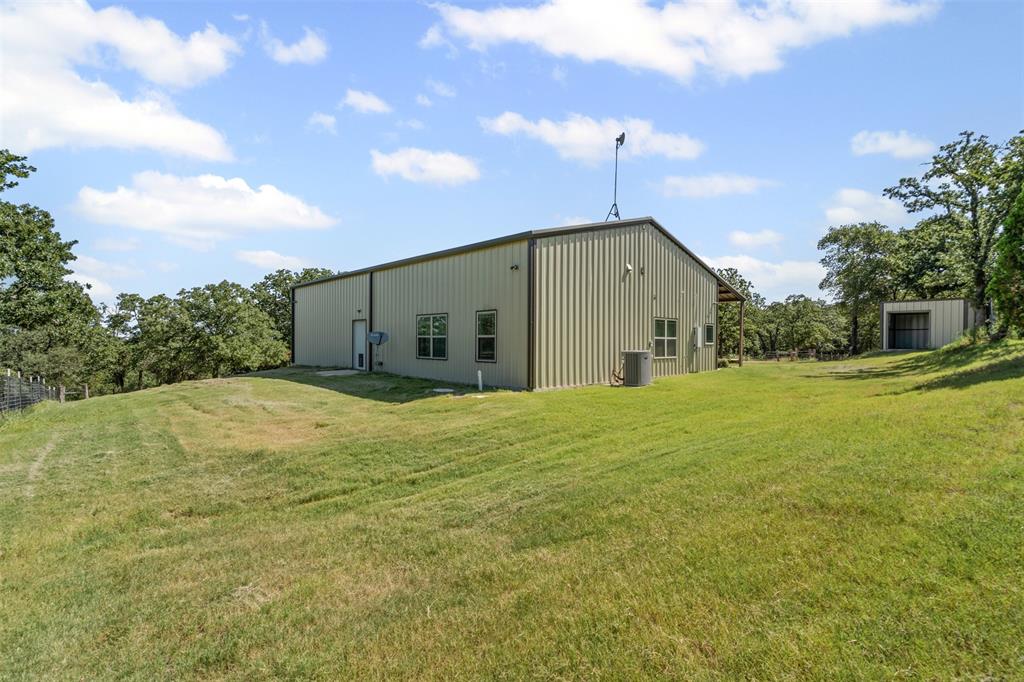 166 South Bronco Court Springtown, TX 76082 - Photo 20 of 40 a big house with a big yard