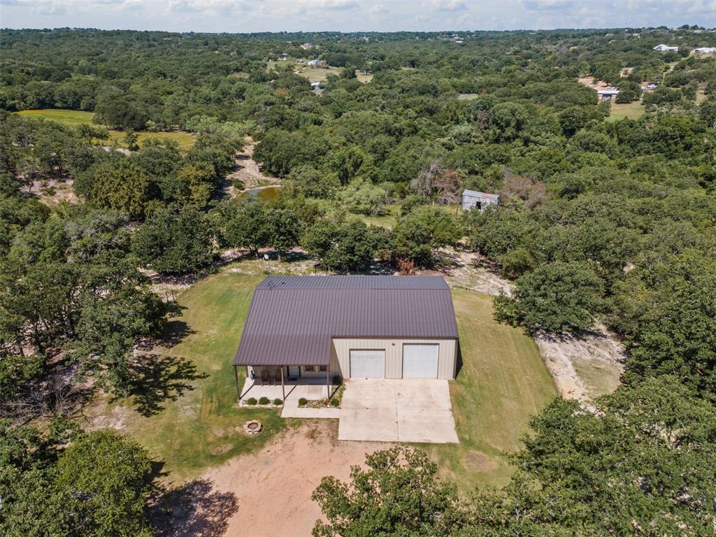 166 South Bronco Court Springtown, TX 76082 - Photo 2 of 40 an aerial view of a house