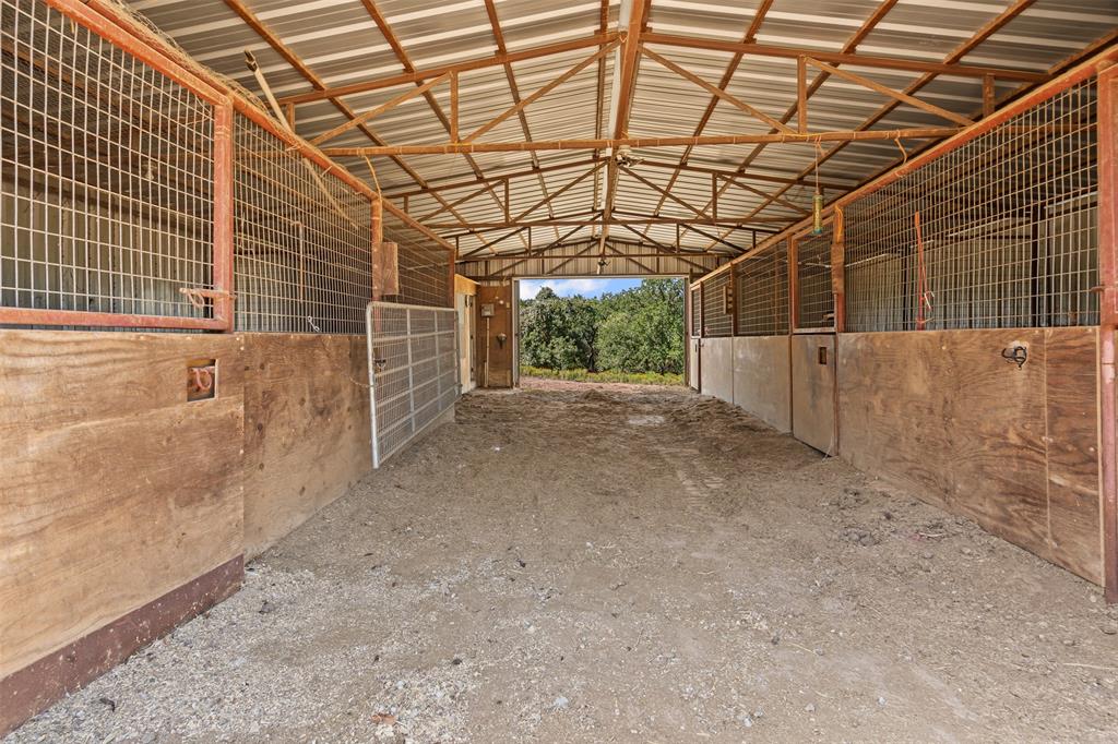 166 South Bronco Court Springtown, TX 76082 - Photo 27 of 40 a view of a garage