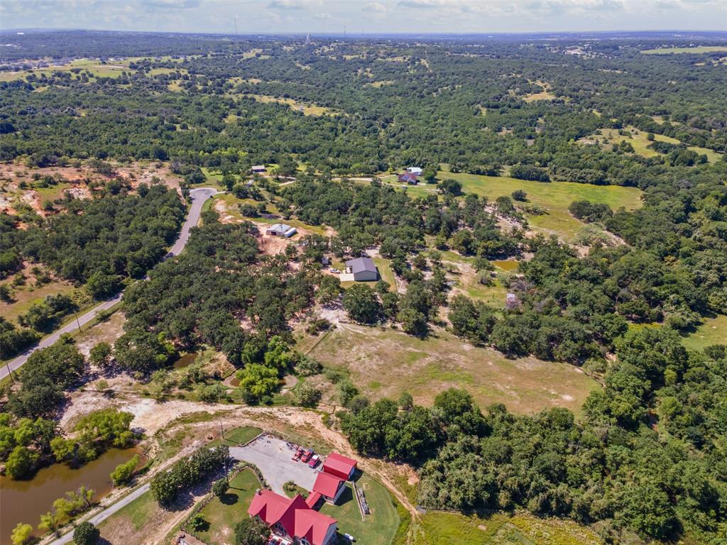 166 South Bronco Court Springtown, TX 76082 - Photo 31 of 40 an aerial view of residential house and outdoor space