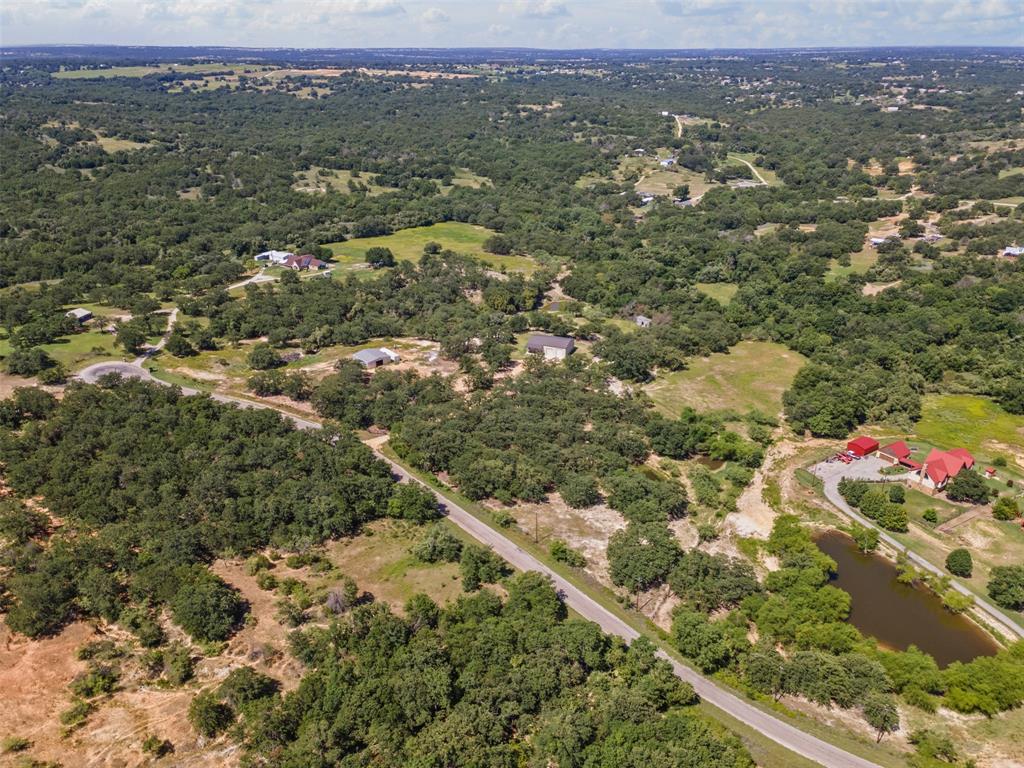 166 South Bronco Court Springtown, TX 76082 - Photo 32 of 40 an aerial view of a city