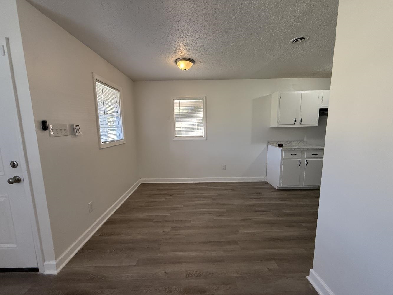 4900 Berta Road Memphis, TN 38109 - Photo 12 of 26 a view of a kitchen with a sink and dishwasher