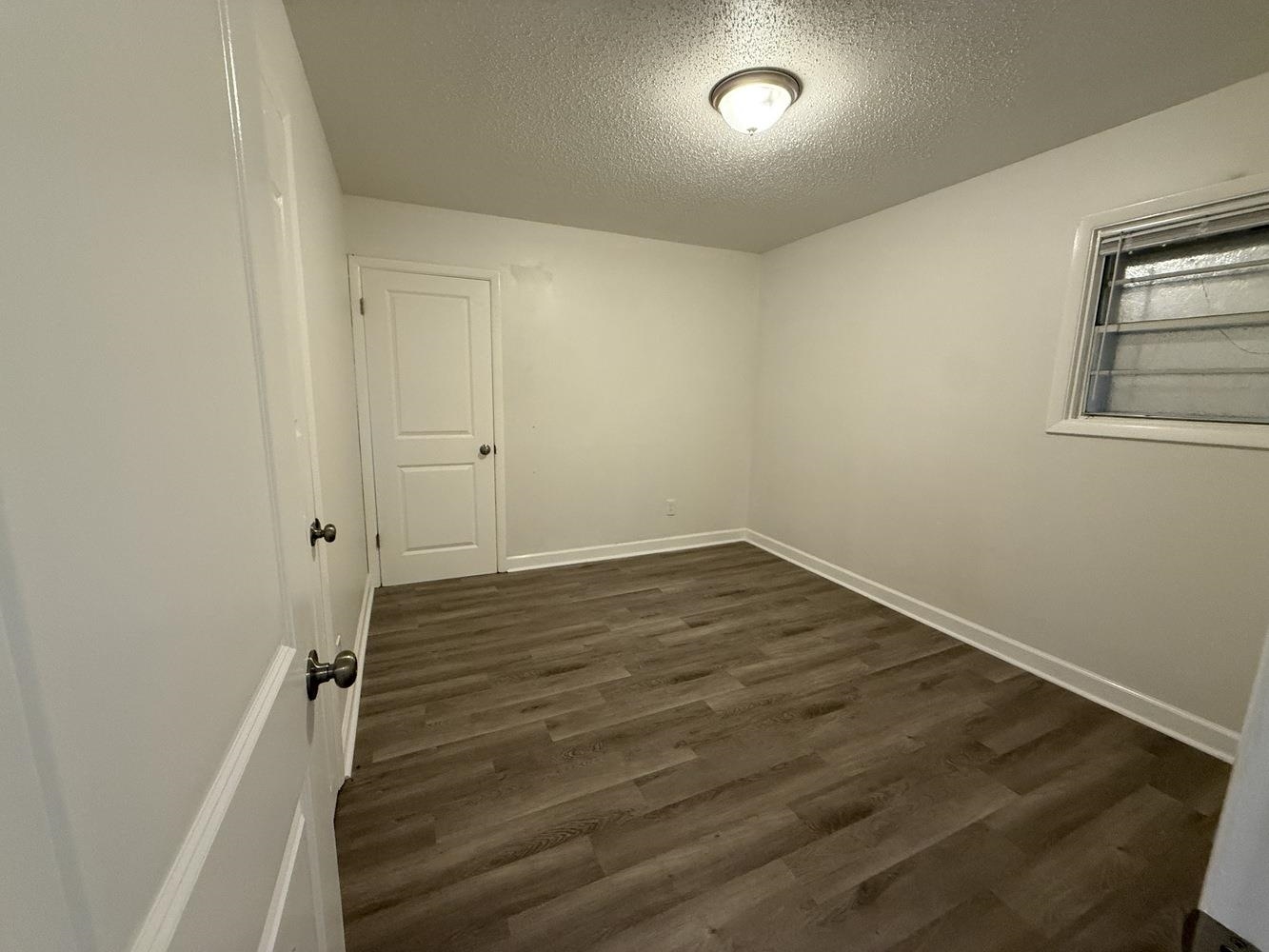 4900 Berta Road Memphis, TN 38109 - Photo 23 of 26 wooden floor in an empty room