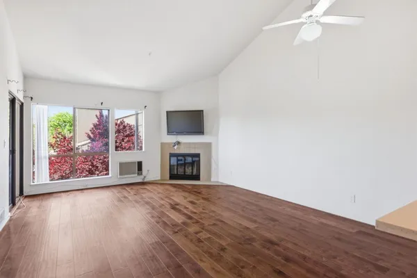 a living room with furniture and white walls