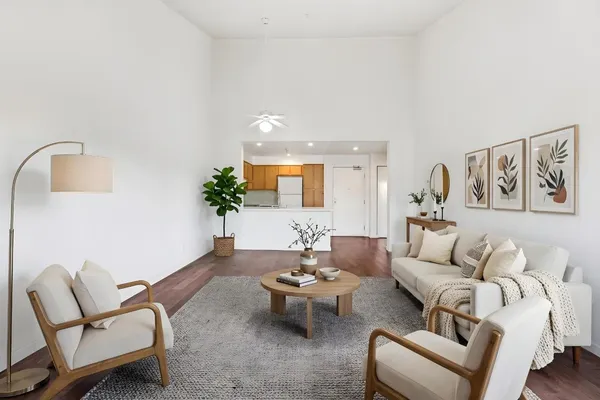 a view of an empty room and wooden floor