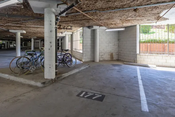a view of a garage with a lot of stuff