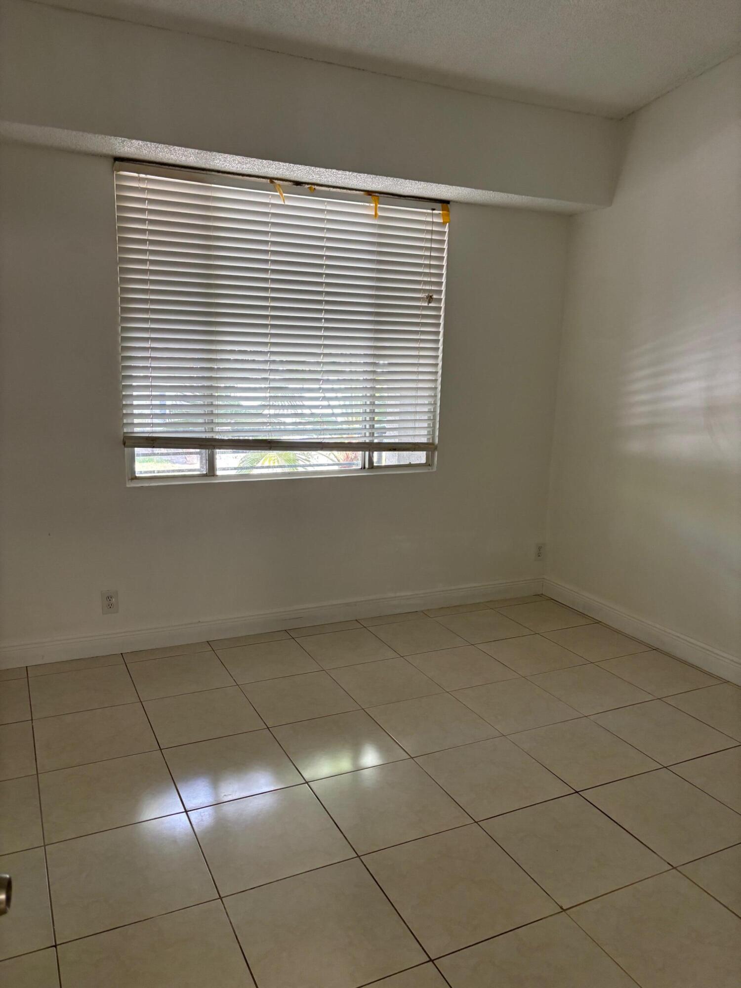 811 Lyons Road, Unit 20203 Coconut Creek, FL 33063 - Photo 11 of 12 IMG_7270