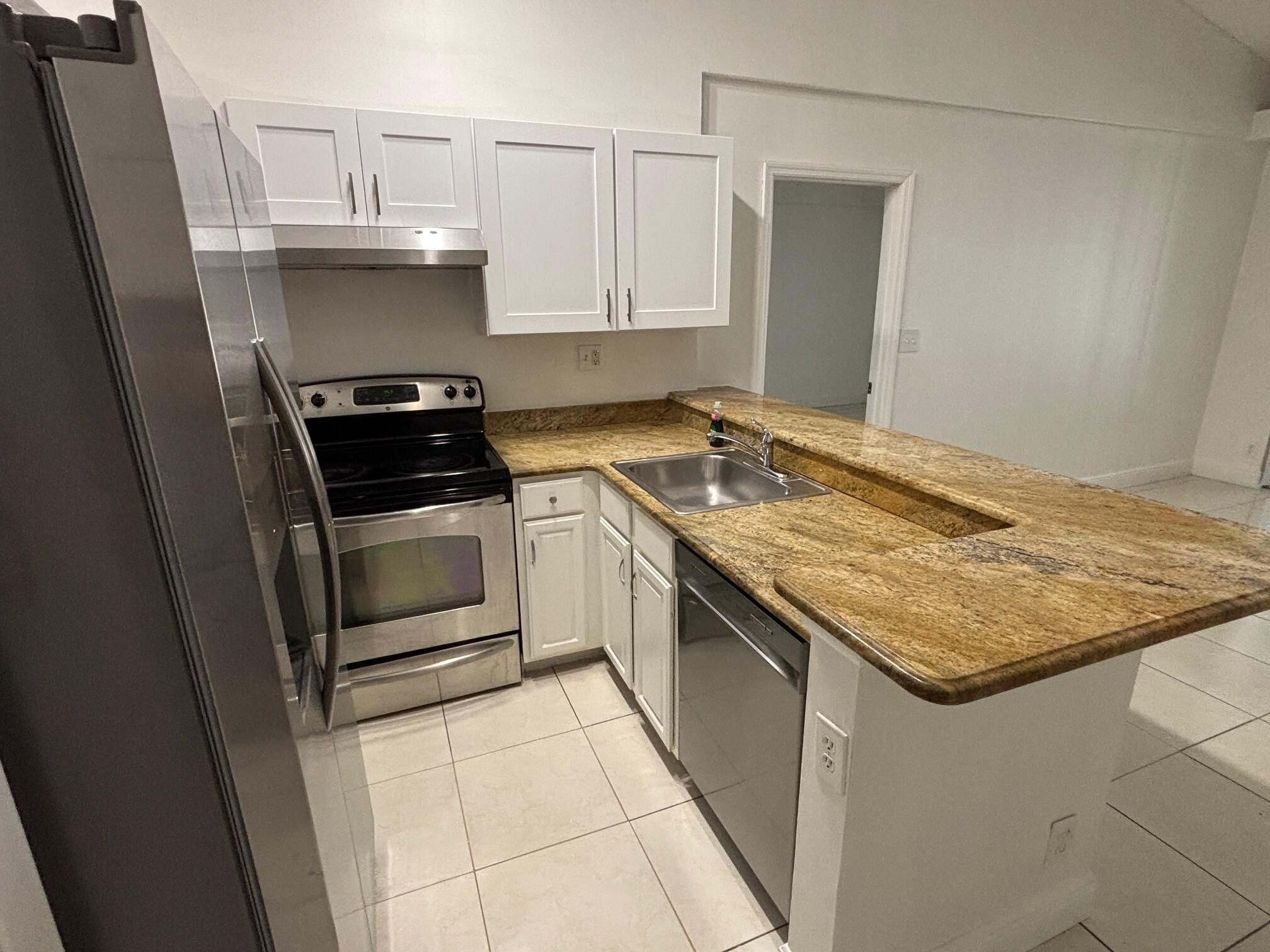 811 Lyons Road, Unit 20203 Coconut Creek, FL 33063 - Photo 2 of 12 IMG_7261