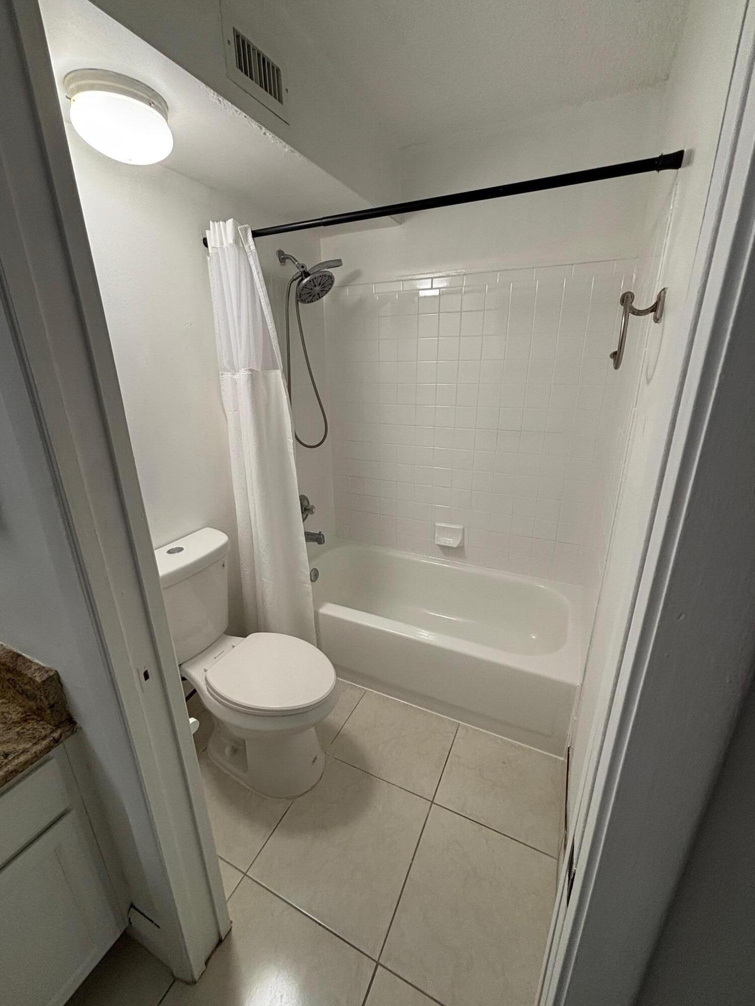 811 Lyons Road, Unit 20203 Coconut Creek, FL 33063 - Photo 4 of 12 IMG_7263