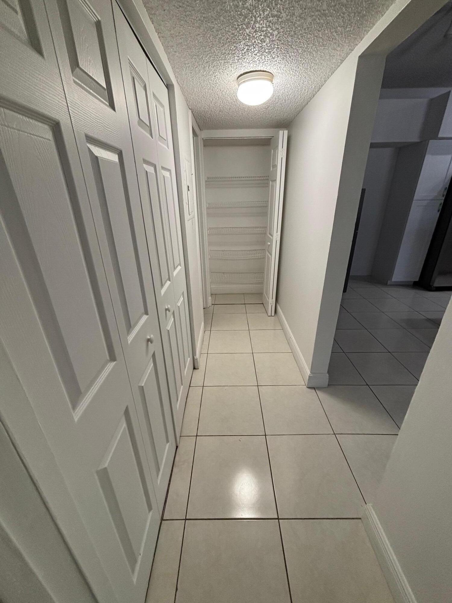 811 Lyons Road, Unit 20203 Coconut Creek, FL 33063 - Photo 7 of 12 IMG_7266