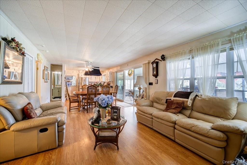 307 Beaver Lake Road Livingston Manor, NY 12758 - Photo 14 of 36 a living room with furniture and wooden floor