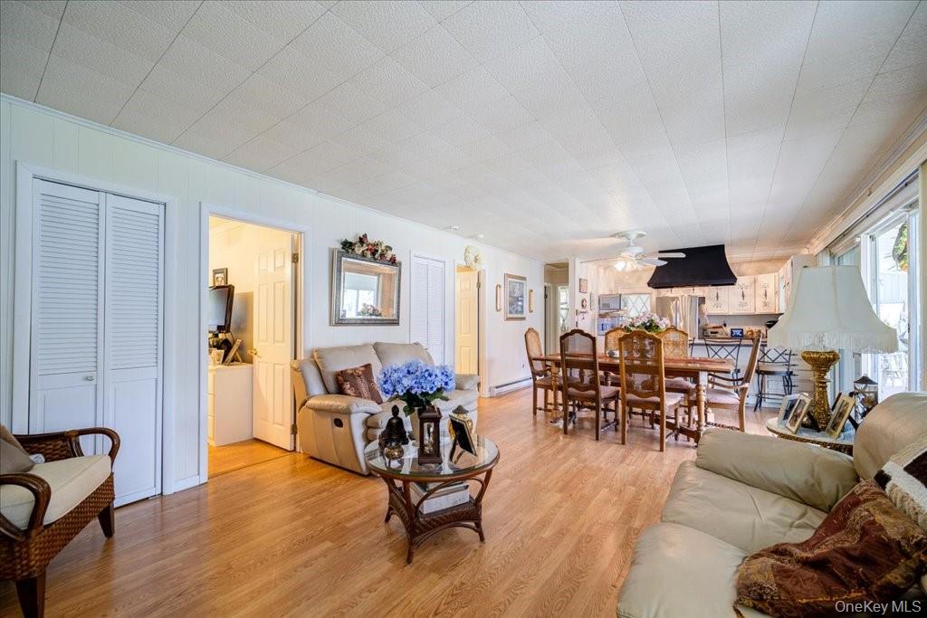 307 Beaver Lake Road Livingston Manor, NY 12758 - Photo 16 of 36 a living room with furniture and wooden floor