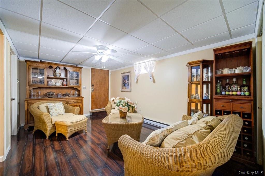 307 Beaver Lake Road Livingston Manor, NY 12758 - Photo 31 of 36 a living room with furniture and a book shelf