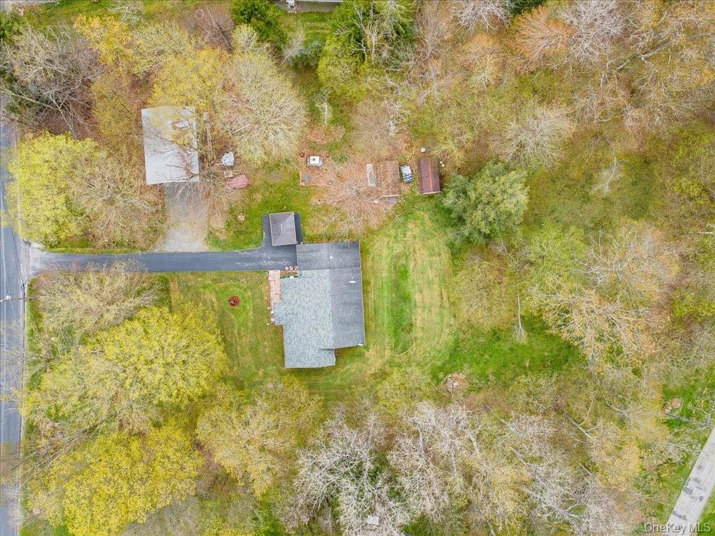 307 Beaver Lake Road Livingston Manor, NY 12758 - Photo 33 of 36 a building with a yard