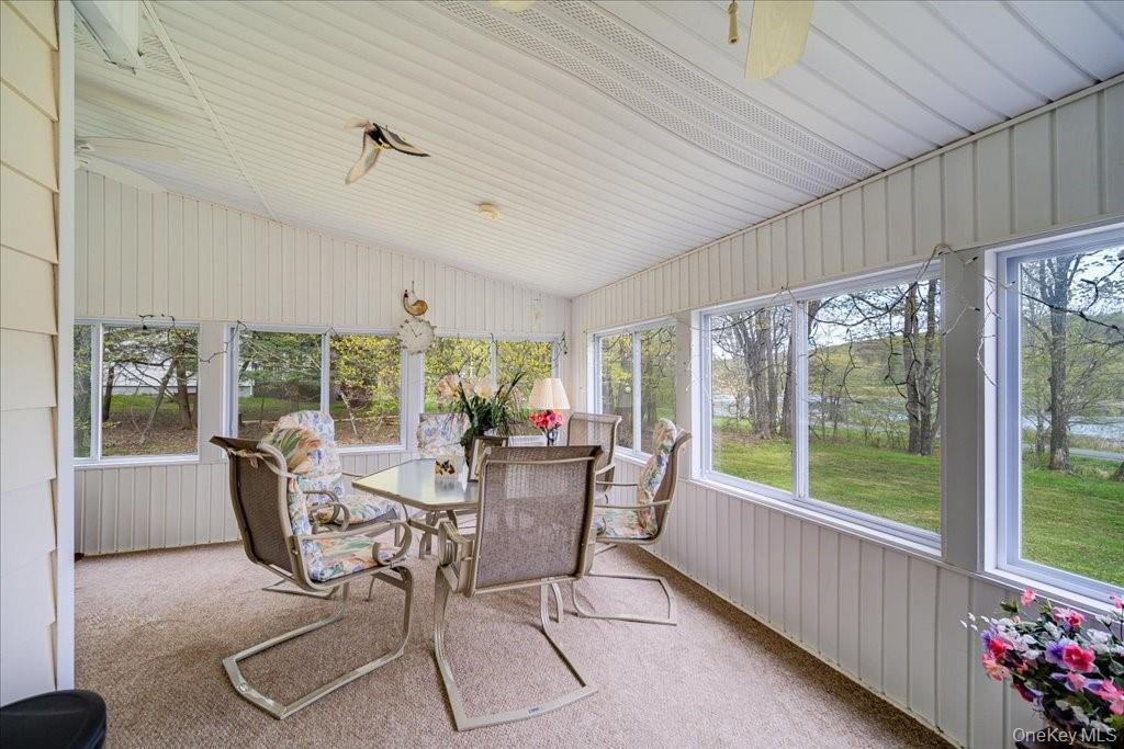 307 Beaver Lake Road Livingston Manor, NY 12758 - Photo 7 of 36 a dining room with furniture window and outside view
