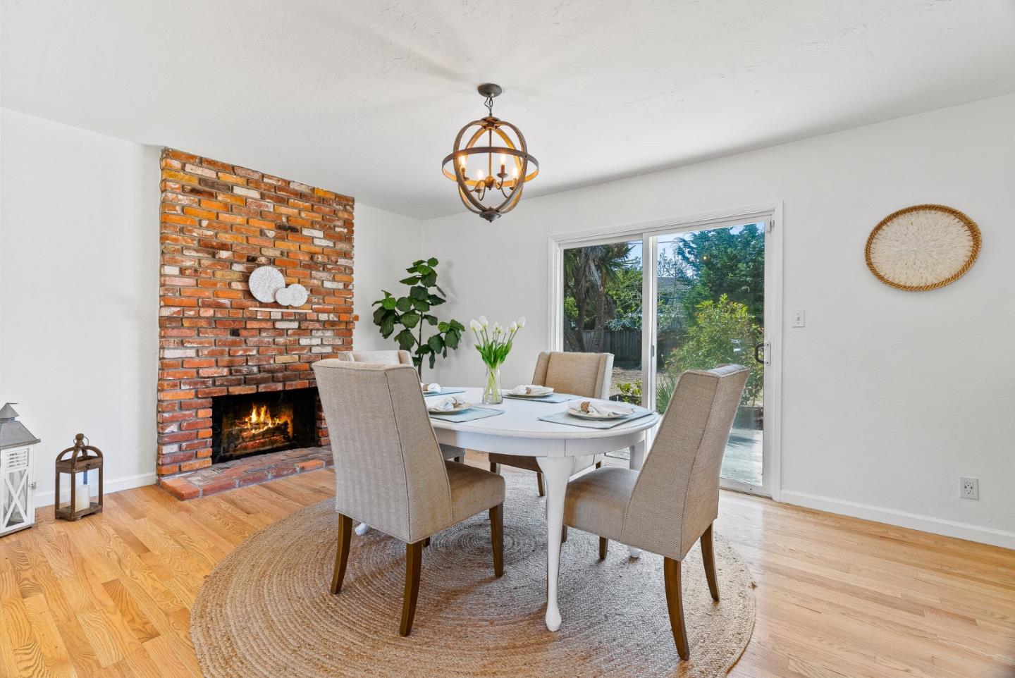 829 Monterey Avenue Capitola, CA 95010 - Photo 12 of 59 a view of a dining room with furniture window and wooden floor