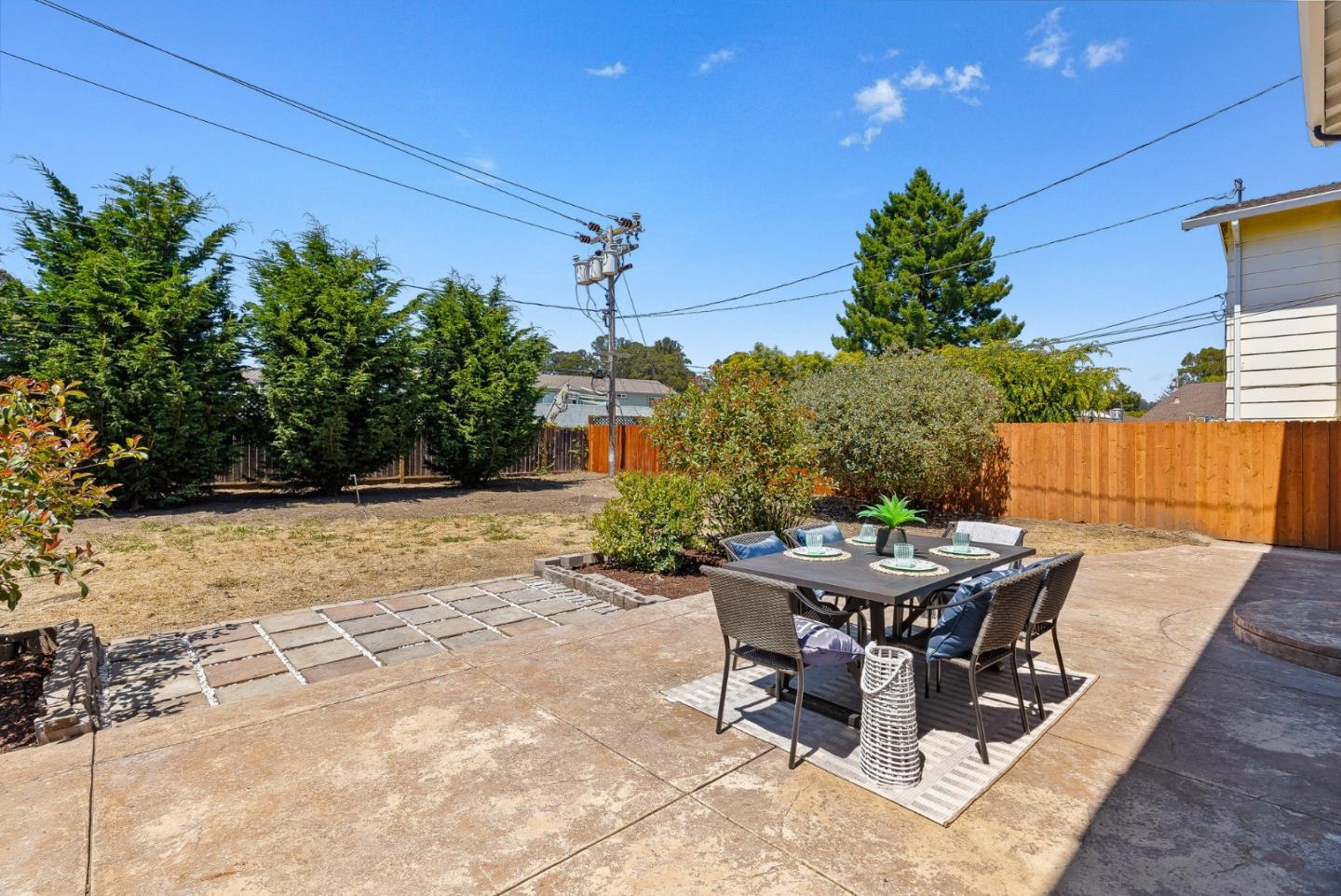 829 Monterey Avenue Capitola, CA 95010 - Photo 27 of 59 a view of a backyard with sitting area