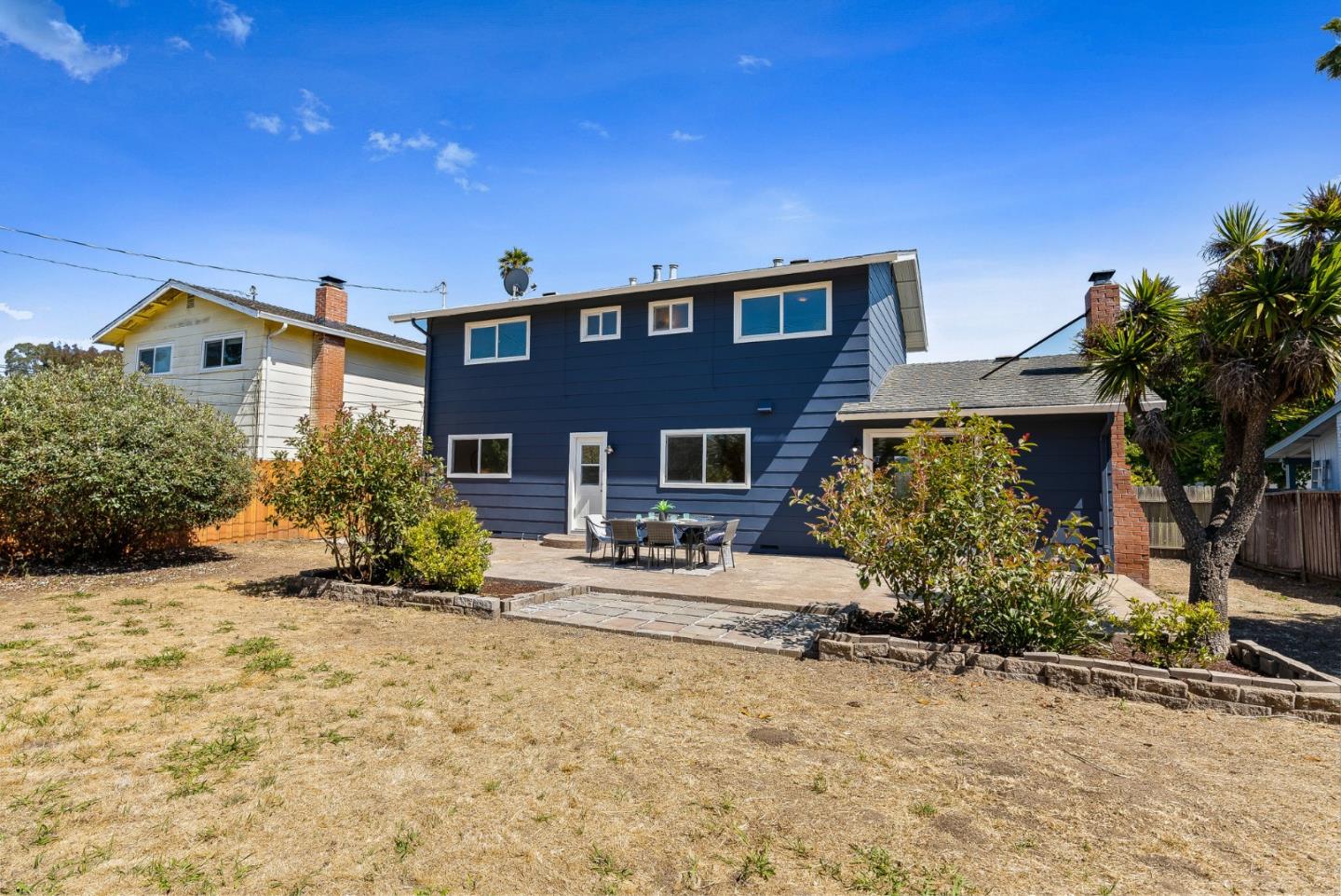 829 Monterey Avenue Capitola, CA 95010 - Photo 32 of 59 a front view of a house with a yard
