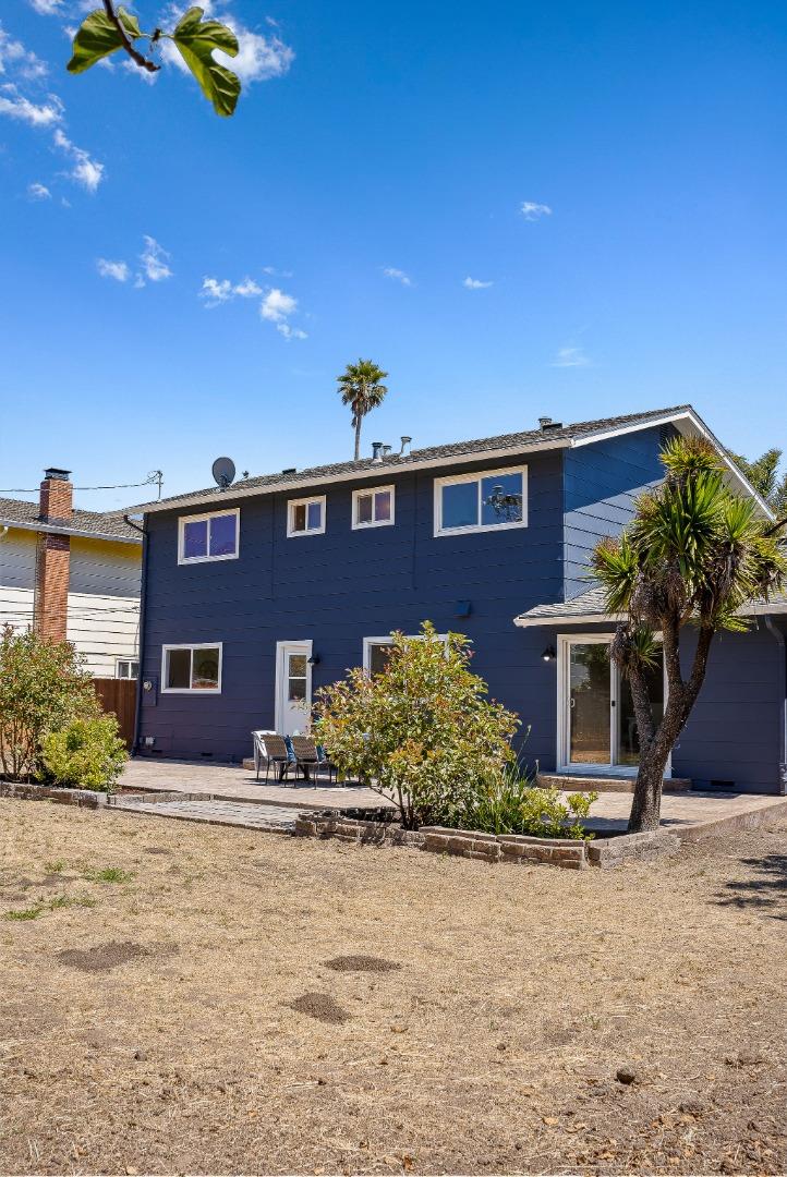 829 Monterey Avenue Capitola, CA 95010 - Photo 36 of 59 a front view of a house with a yard