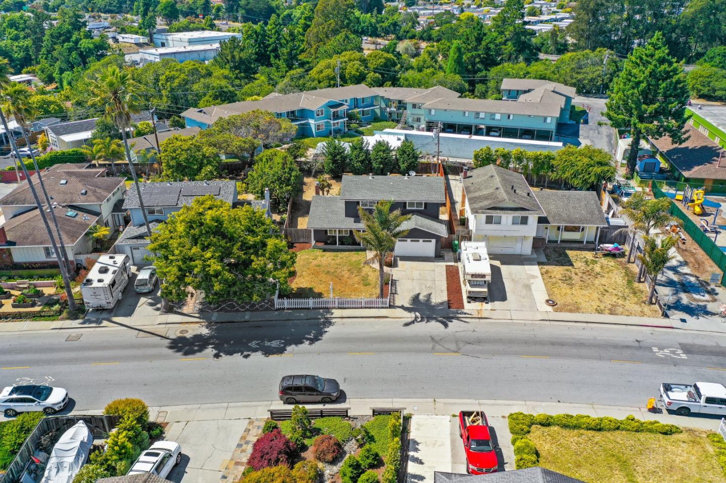 829 Monterey Avenue Capitola, CA 95010 - Photo 41 of 59 an aerial view of residential houses and car parked on street side