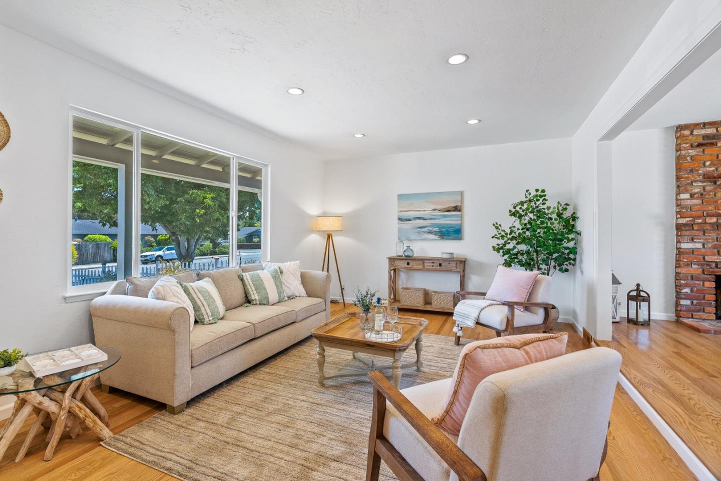 829 Monterey Avenue Capitola, CA 95010 - Photo 10 of 59 a living room with furniture and a large window