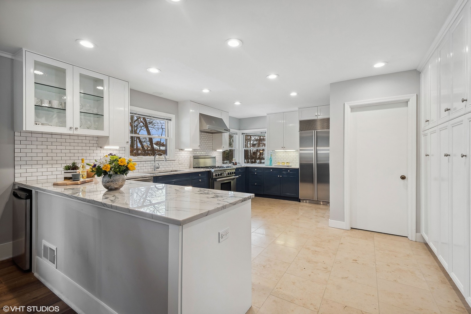 526 Coronet Road Glenview, IL 60025 - Photo 11 of 23 a kitchen with stainless steel appliances granite countertop a sink stove and refrigerator