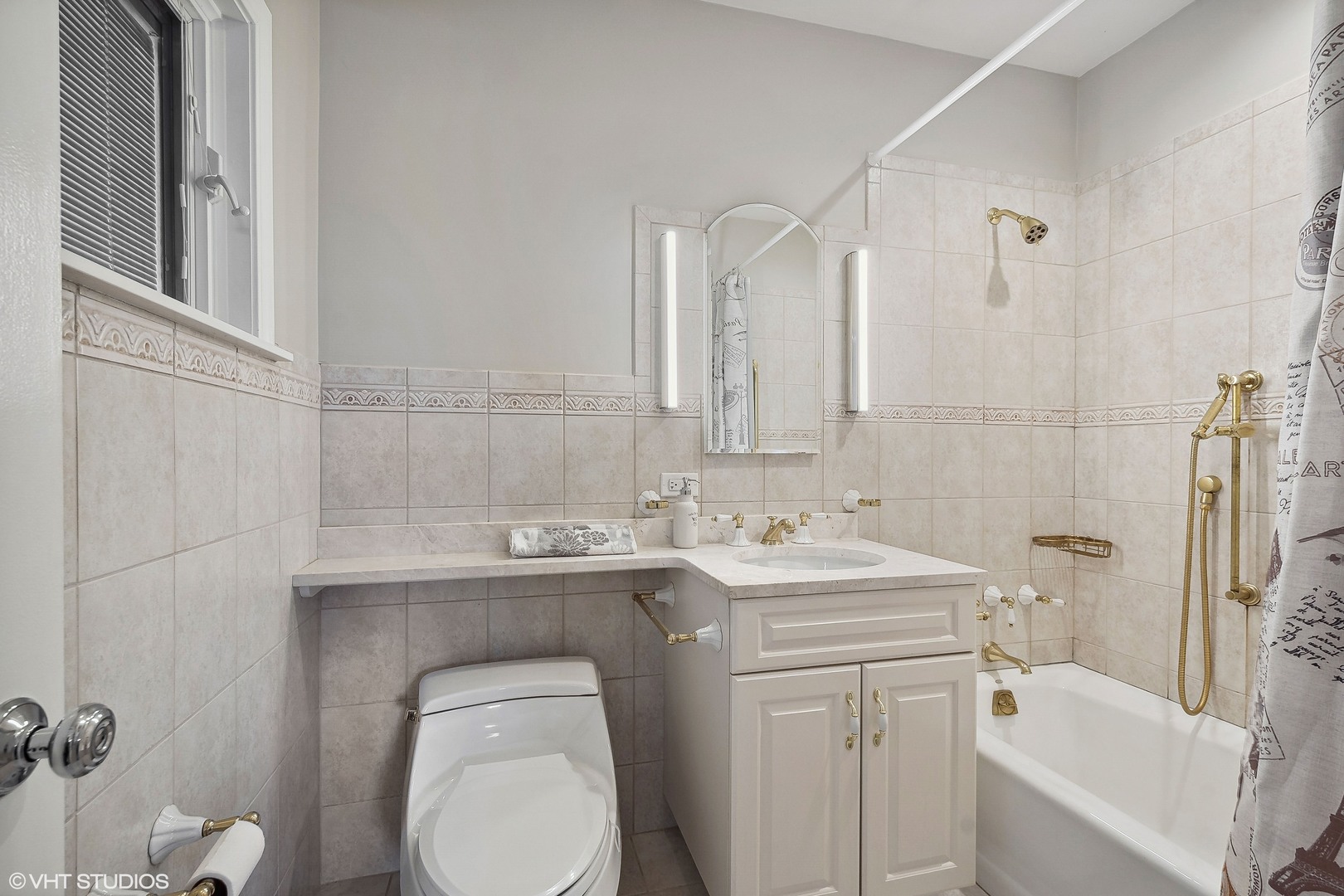 526 Coronet Road Glenview, IL 60025 - Photo 18 of 23 a bathroom with a sink toilet and shower