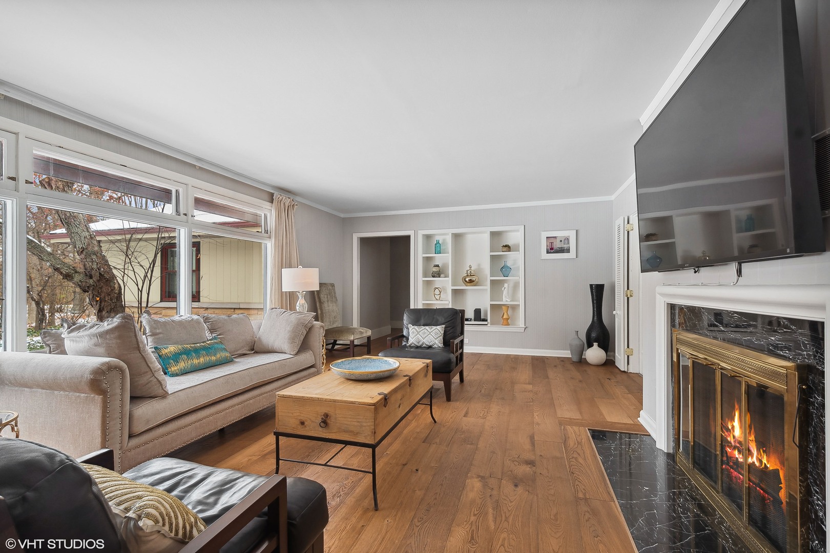 526 Coronet Road Glenview, IL 60025 - Photo 4 of 23 a living room with furniture and a fireplace